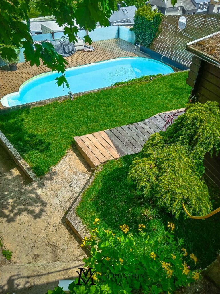 Rooftop pool view with green grass in a house for sale in Rollingergrund Luxembourg