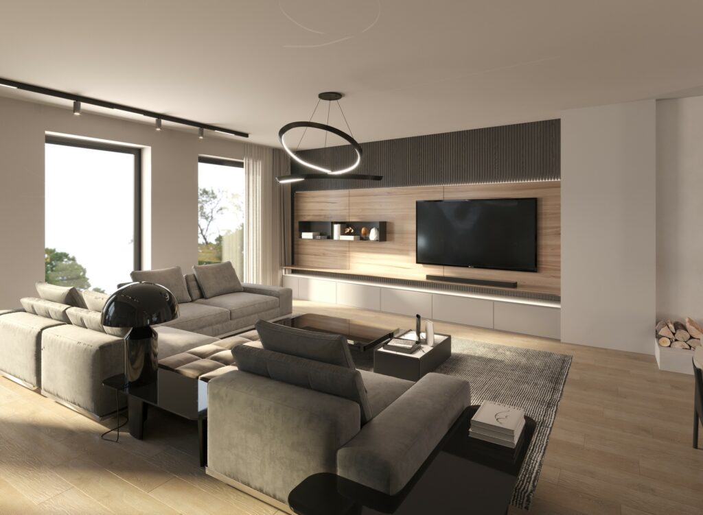 Magnificent luminous interior design living room showing a big grey sofa, wooden flooring, and a TV set up in Luxembourg